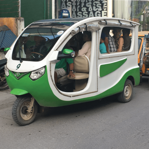 Luxury tuk-tuk transporting passengers in south-east Asia