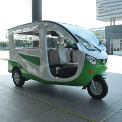 Luxury solar tuk-tuk parked outside Star 8 offices in Philippines
