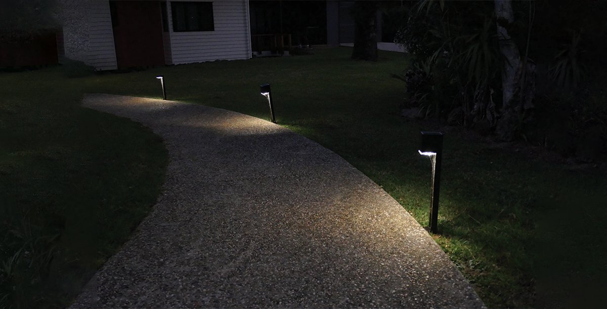 solar lights illuminating path in Brisbane garden