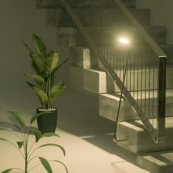 small security light shining on steps inside apartment complex