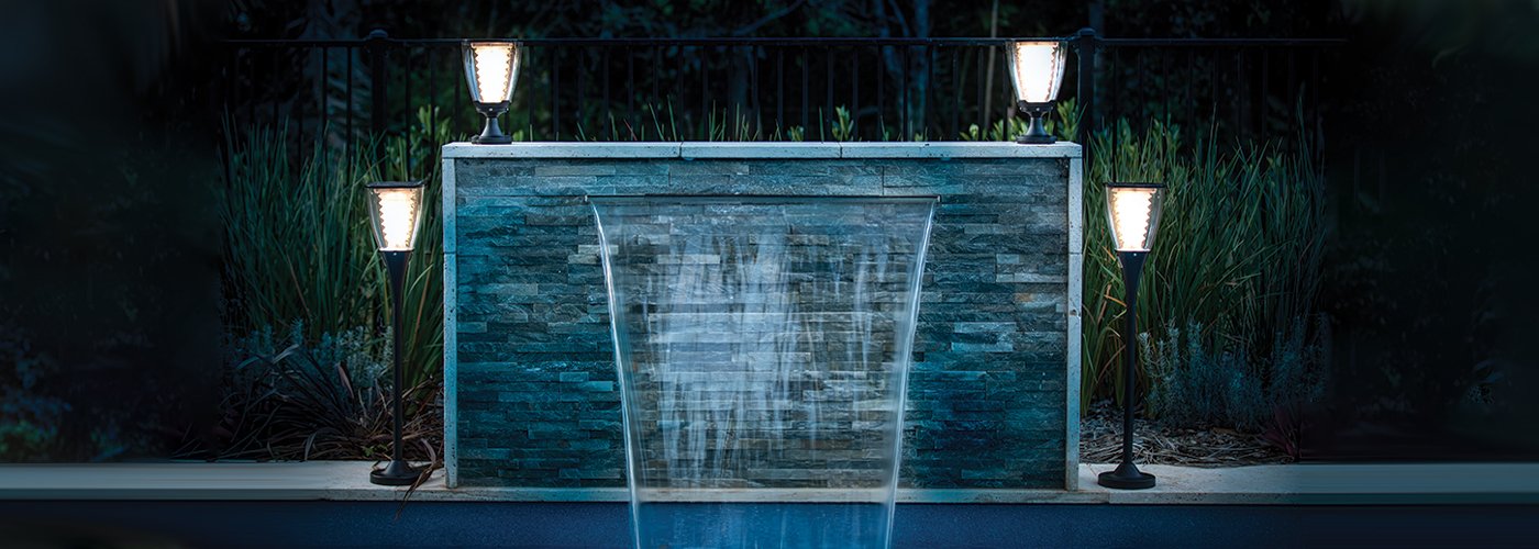 solar garden lights shining in back garden of home in Brisbane