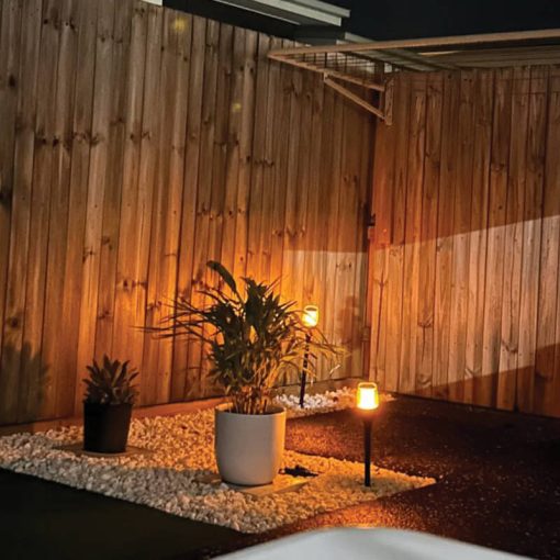 Brisbane backyard with stylish ground pegged solar lights