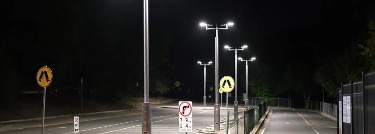 Parking lot being lit up at night by solar lights from Star 8 Australia