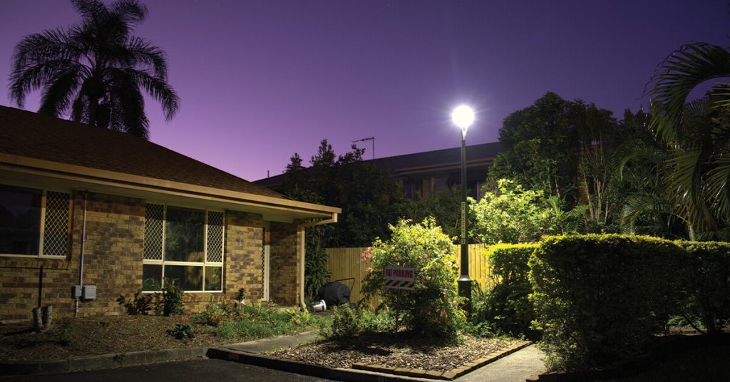 Solar lights along road in townhouse complex