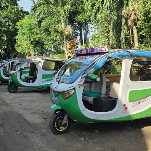 Row of electric tuk-tuks in Thailand